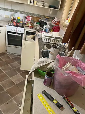 Cluttered Kitchen With an Oven — NatureWise Pest Control In Port Macquarie, NSW