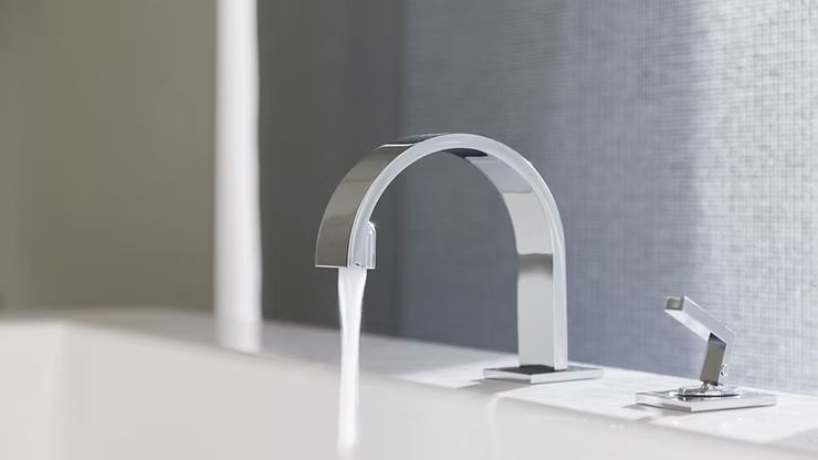 Modern Chrome Faucet With Arch Spout, Water Flowing — NatureWise Pest Control In Port Macquarie, NSW