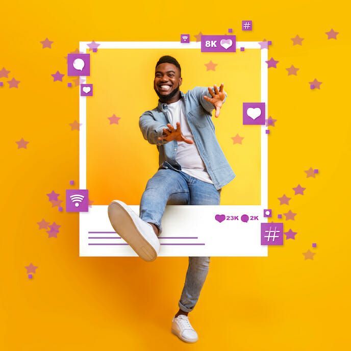 A man is standing in a picture frame on a yellow background.