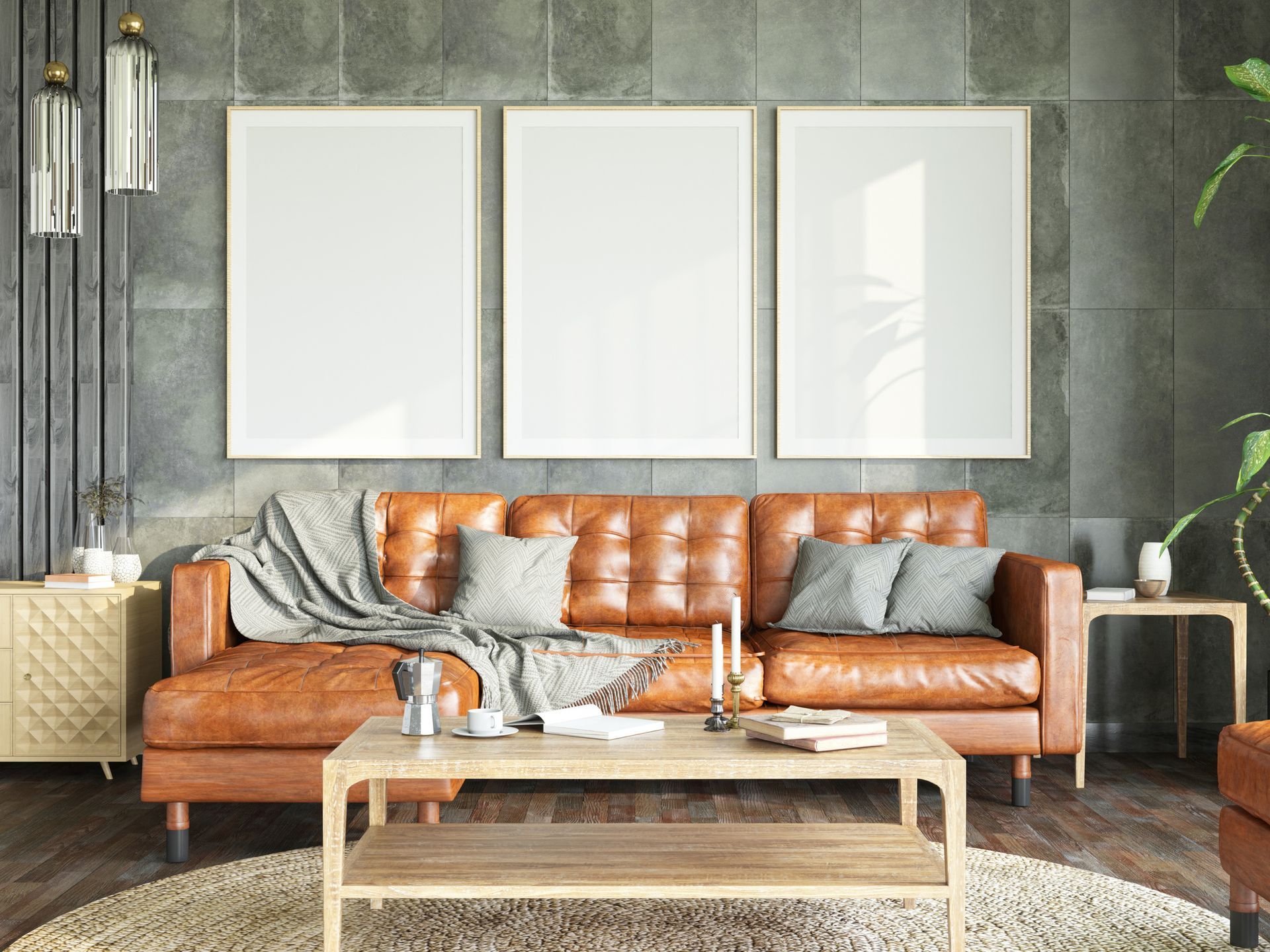 A man is spraying a couch with a spray bottle.