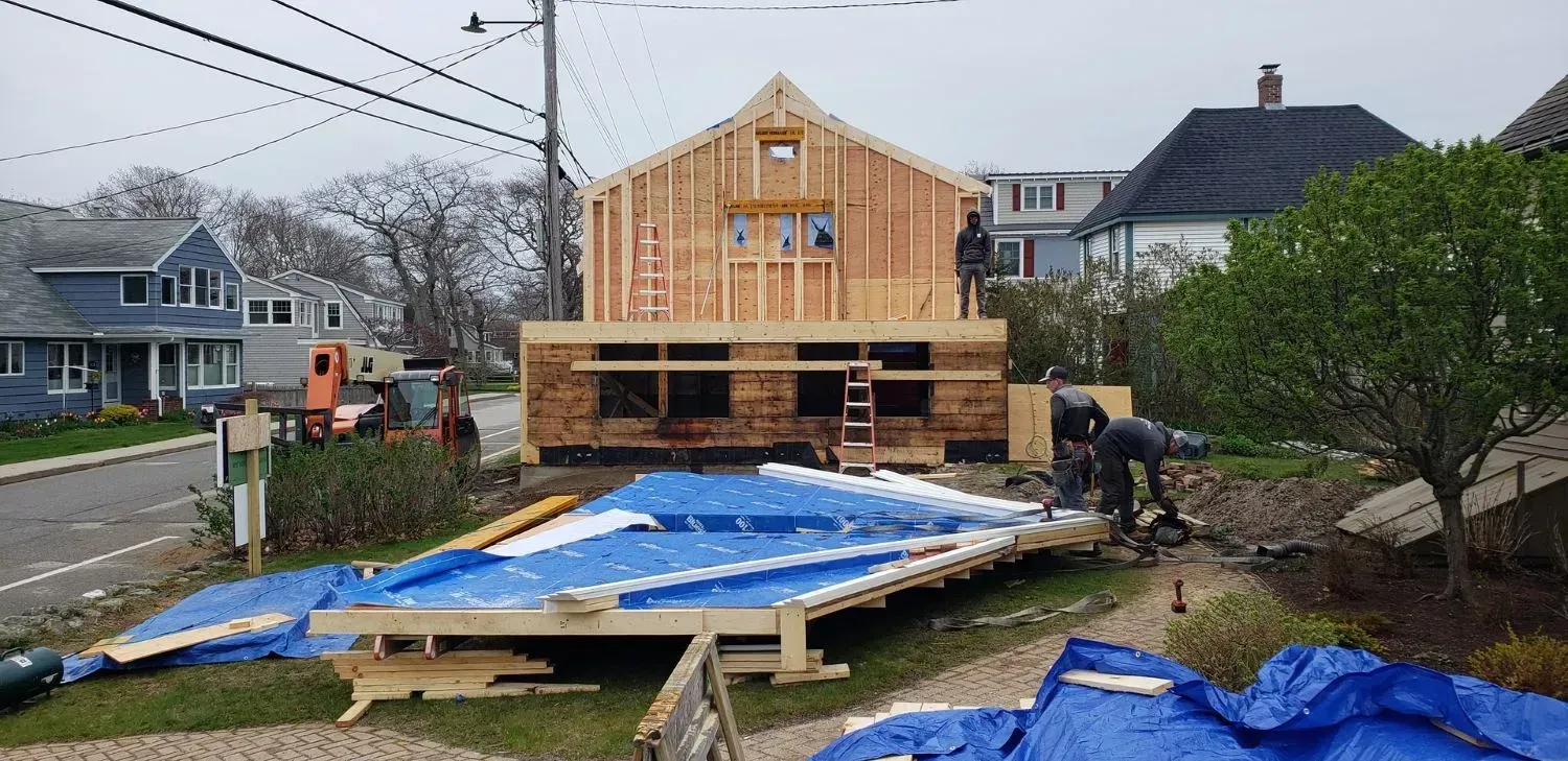 A house is being built in the middle of a residential neighborhood.