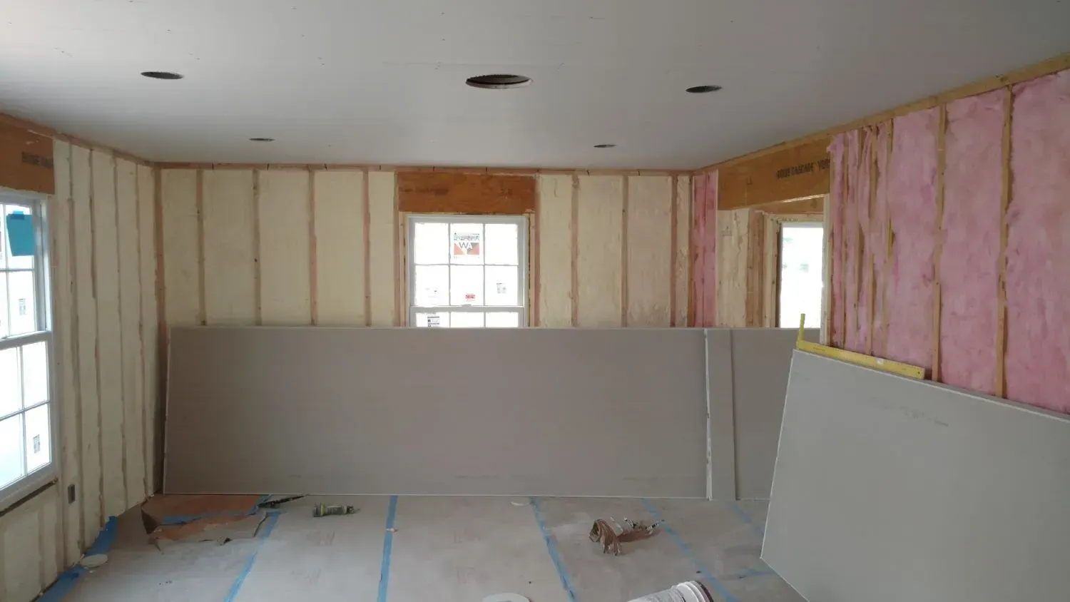 A room with a lot of insulation on the walls and ceiling.