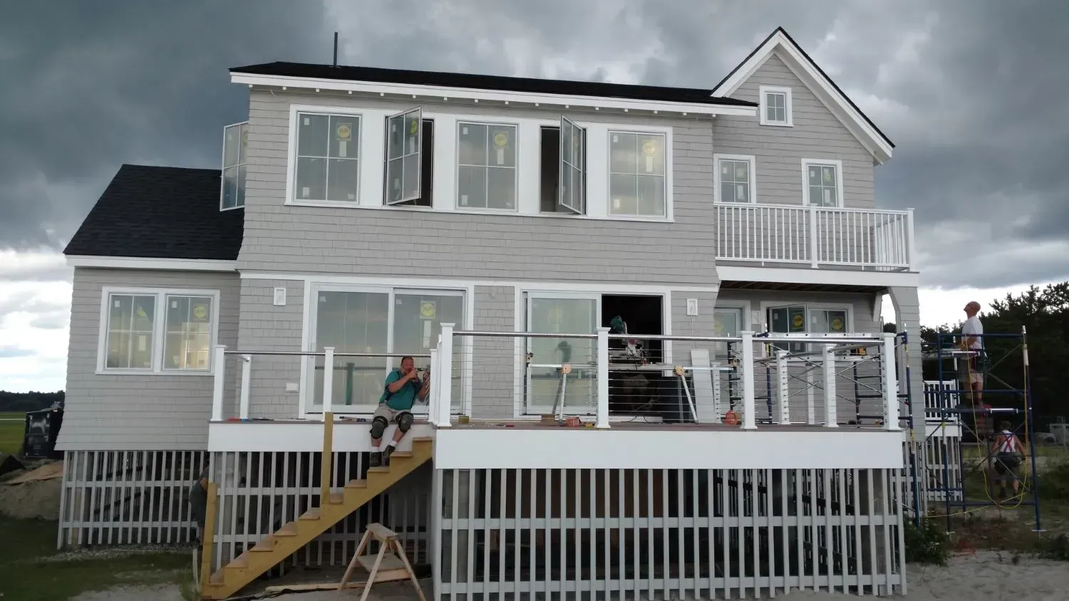 The back of a house with stairs leading up to it