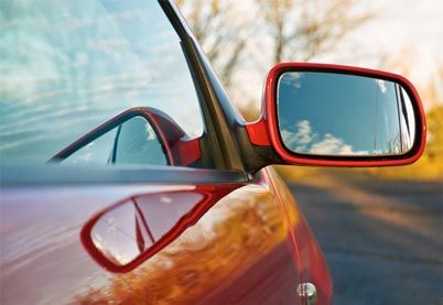 Red car side view - Auto glass repair in Kankakee, IL