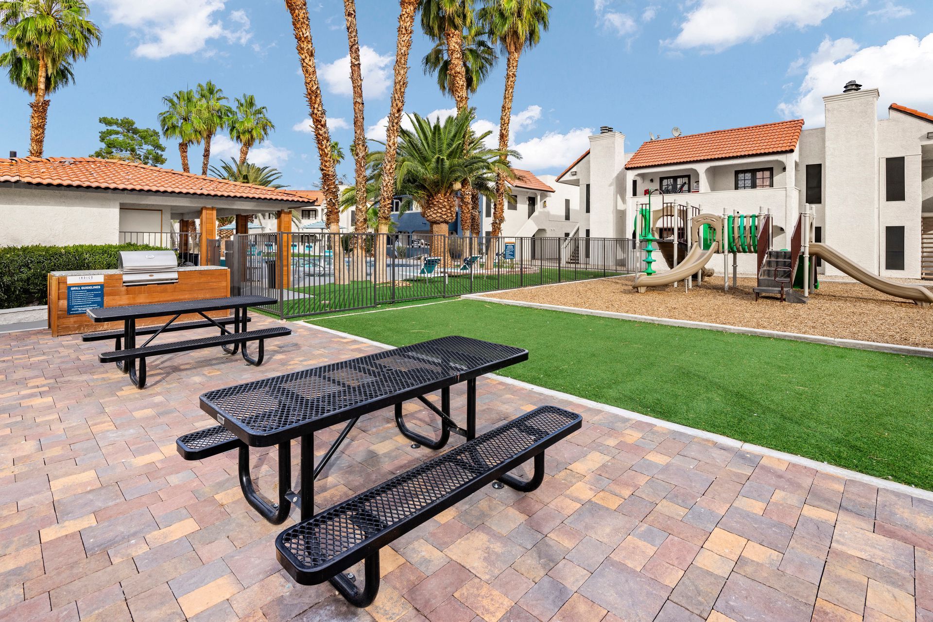 Outdoor grill with dining area.