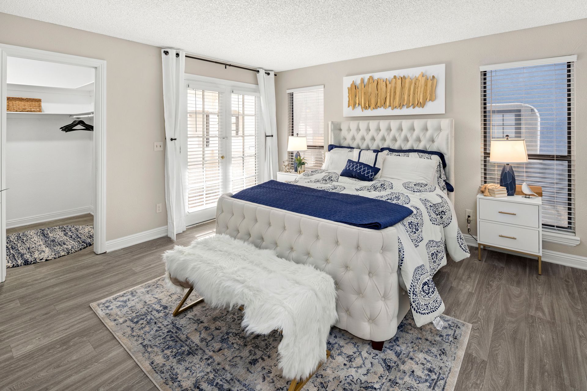 Apartment bedroom with walk-in closets.