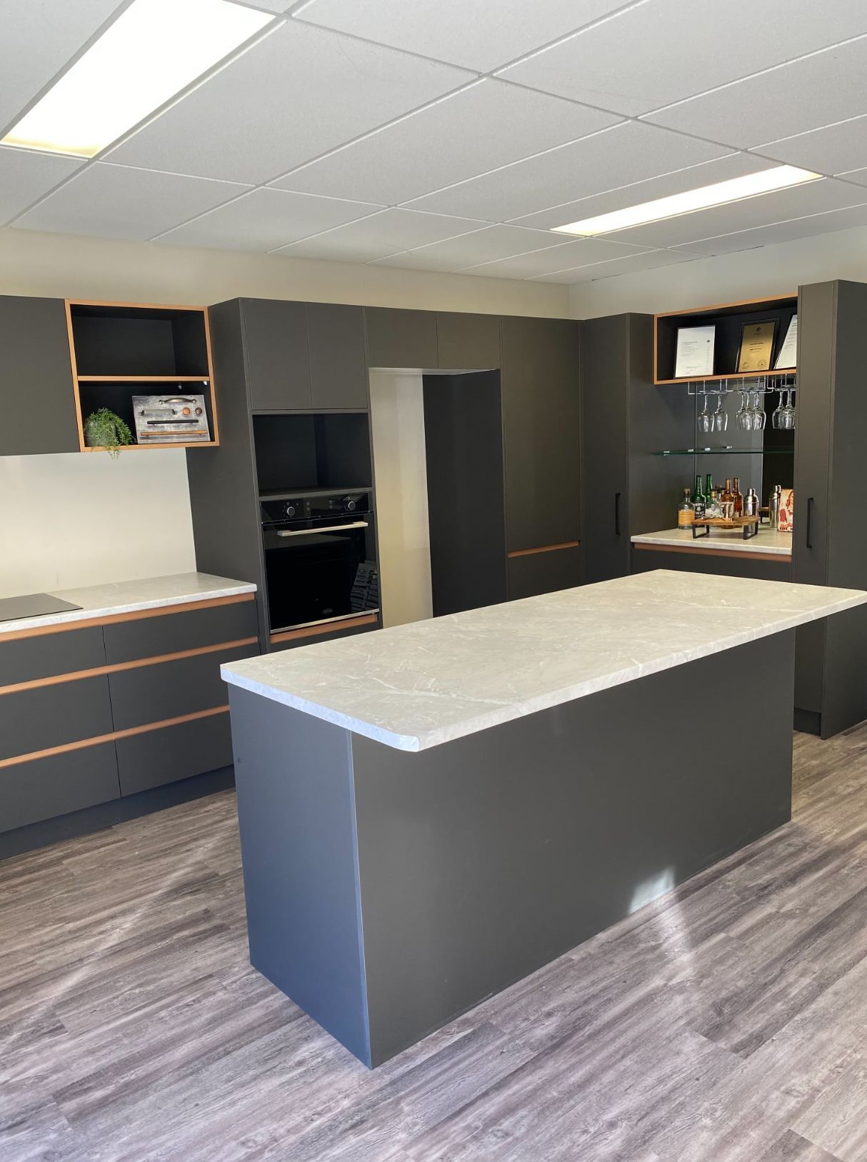 New Kitchen With Grey Cabinets And Island — Cabinet Makers in Charmhaven, NSW