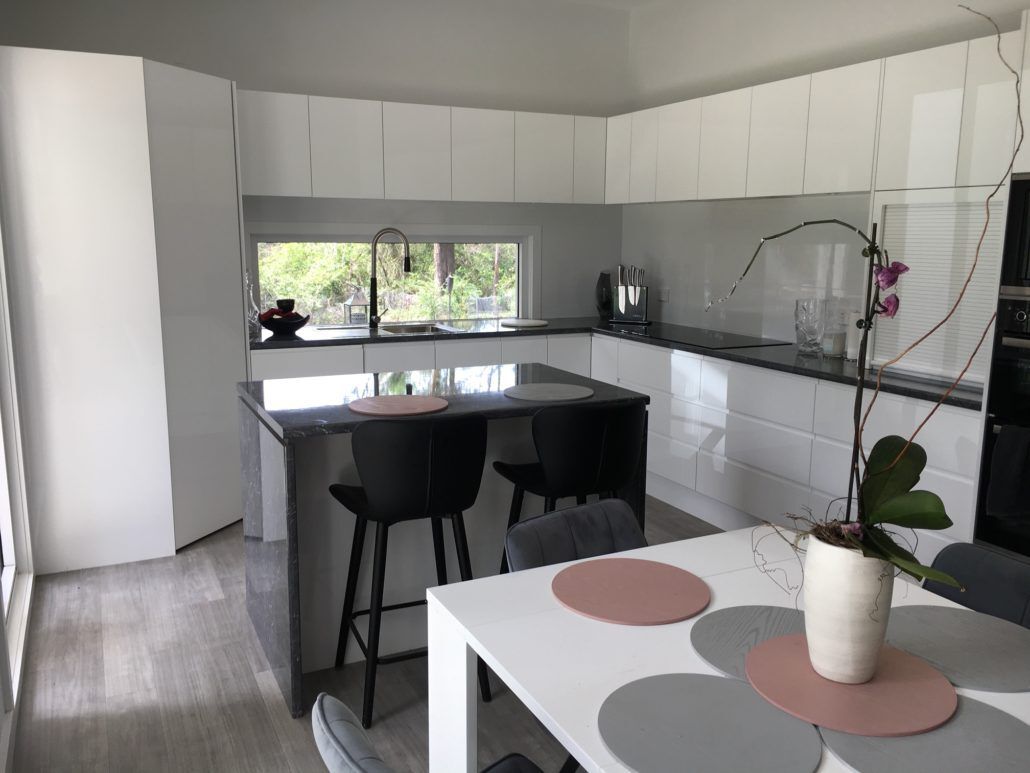 Robertson Small White Kitchen With An Island — Kitchen Designer in Central Coast, NSW