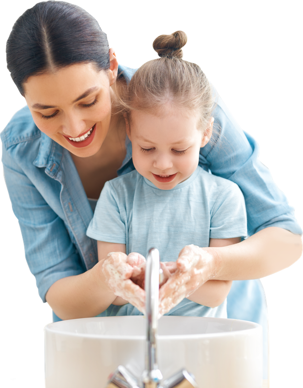 Mother teaching daughter to wash hands properly