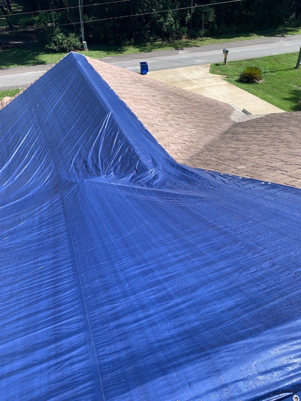 Repair Project with Plastic Tarp Covering the Roof – West Central Florida – All Coast Roofing LLC