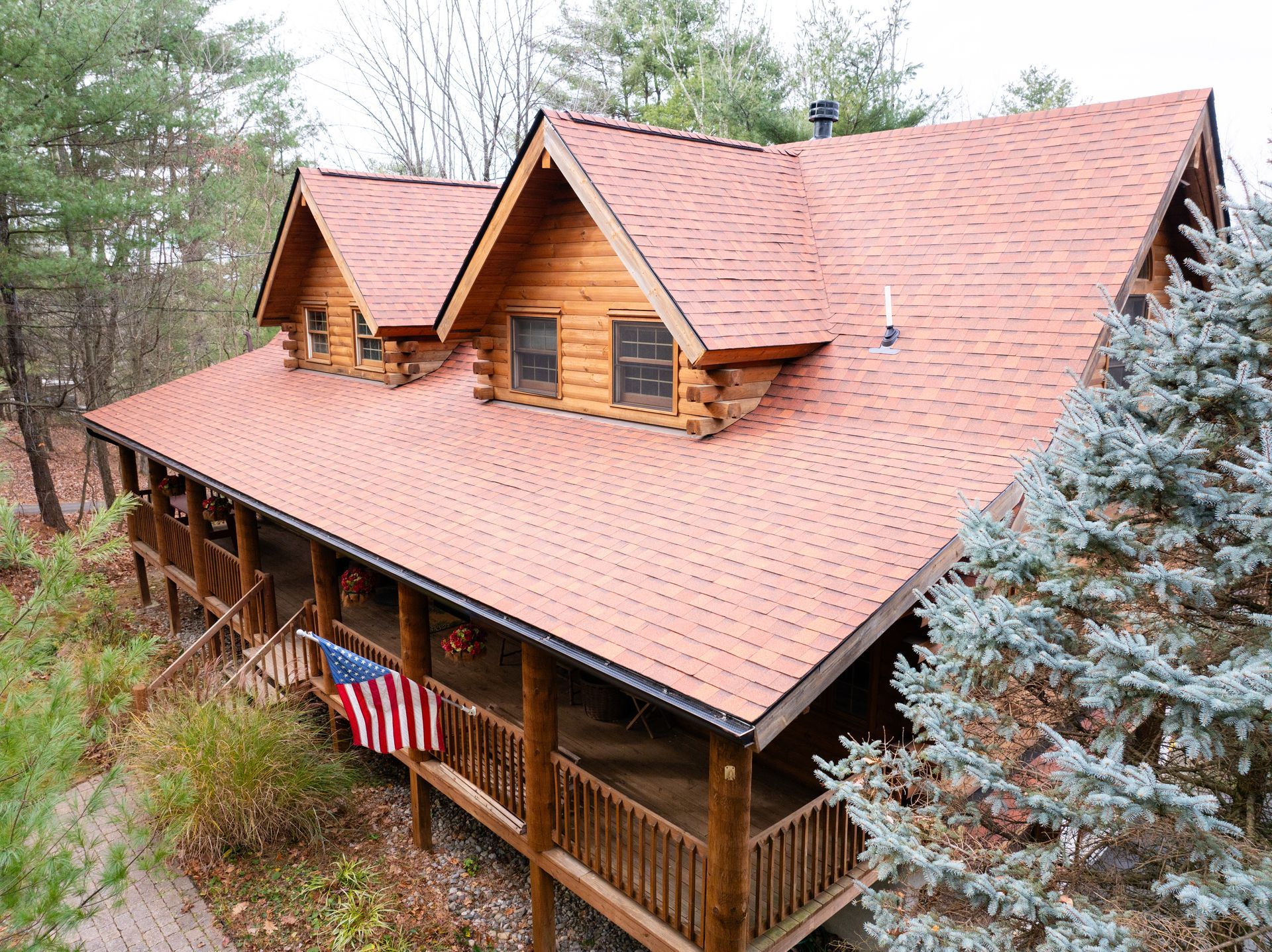 Amazed Roofing installing a new roof on a house