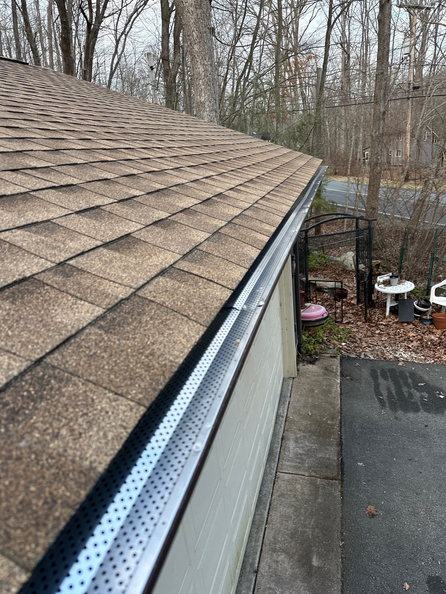 Close-up of roofing materials being installed on a house