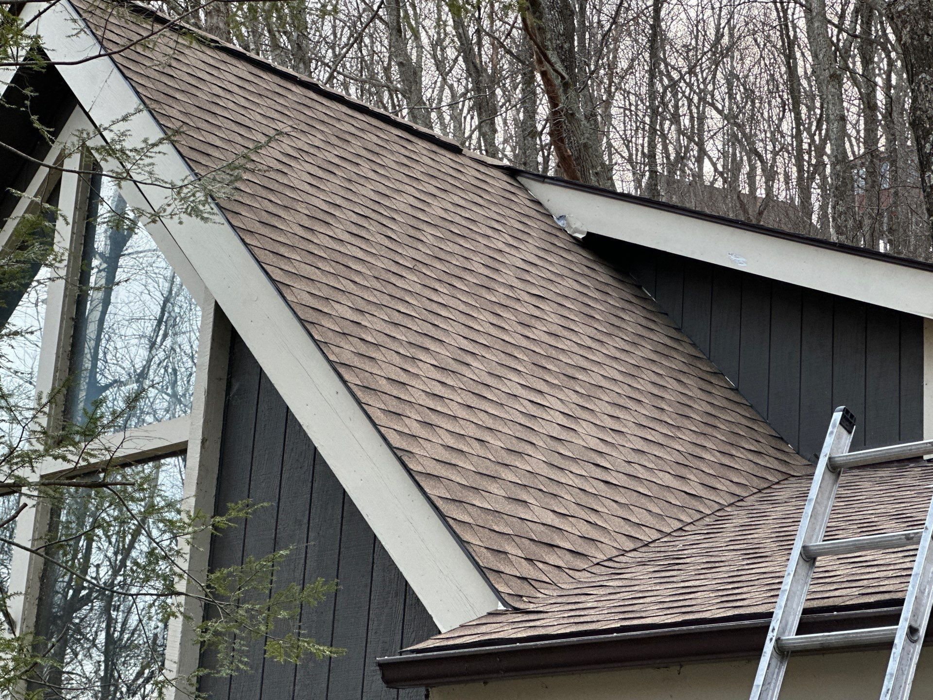 Residential property with a new roof installed by Amazed Roofing
