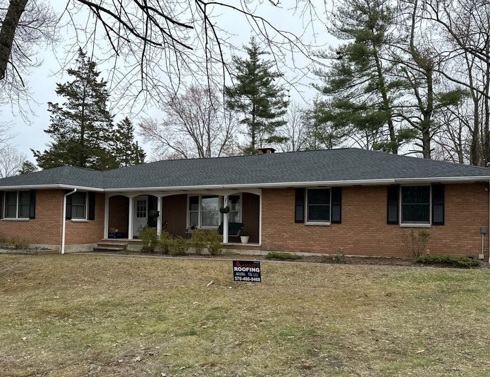 Completed residential roof installation by Amazed Roofing