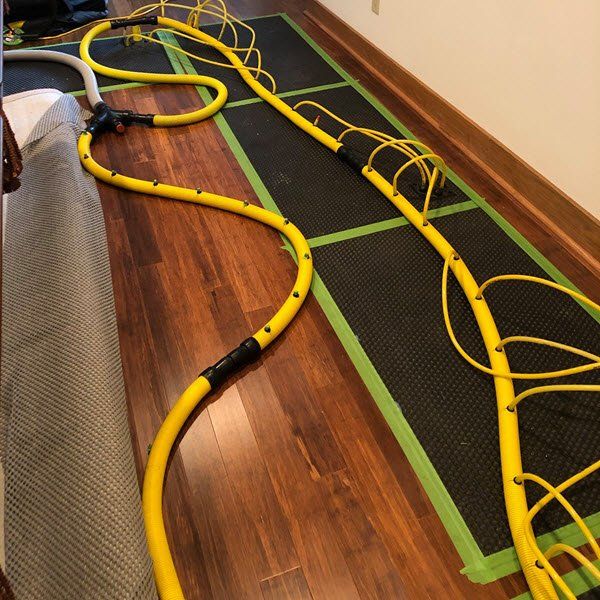 Drying wood floor from water damaged home in Boone