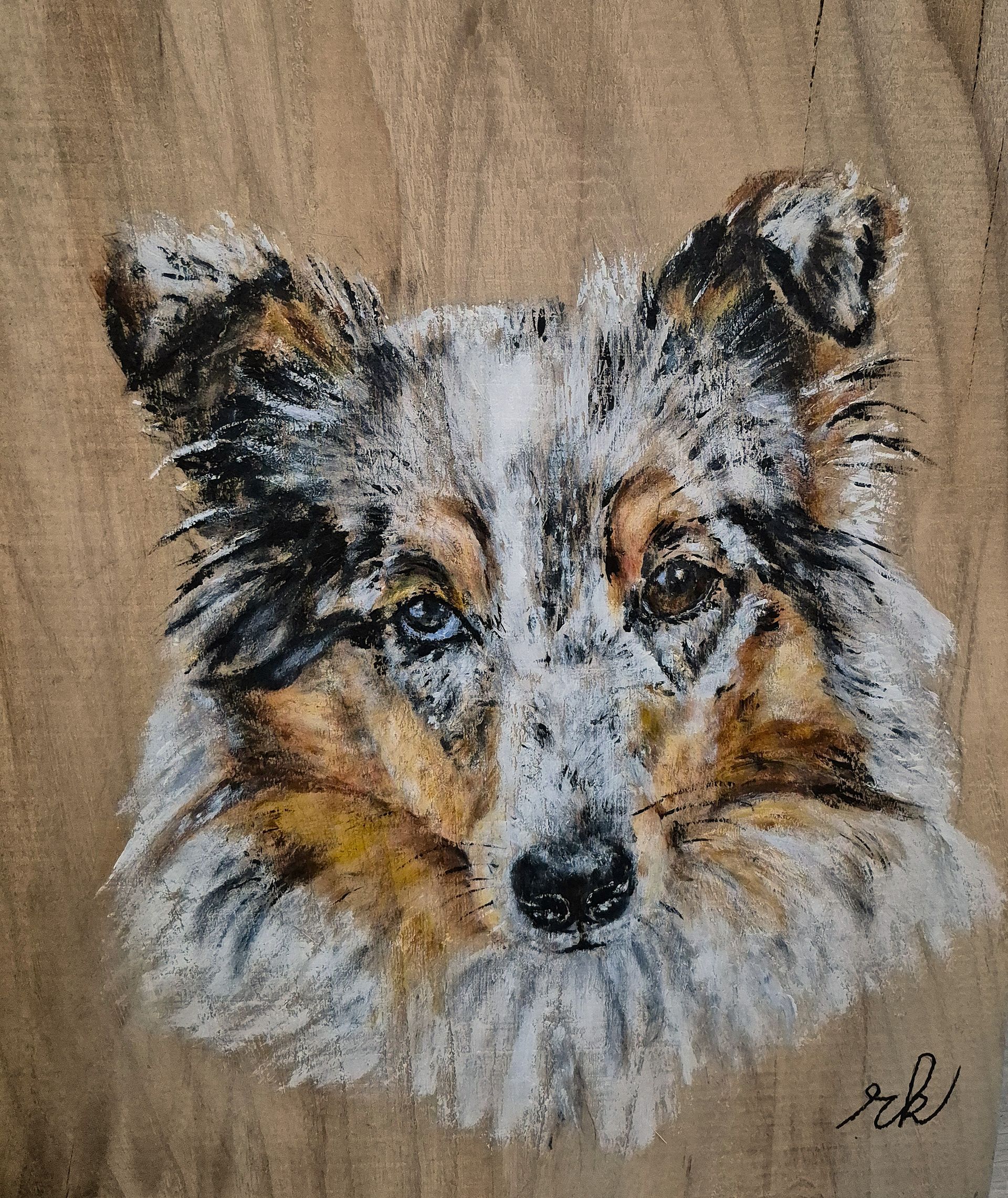 Schilderij van een hond op Hoeksche Waards hout, gemaakt tijdens een creatieve schilderworkshop.