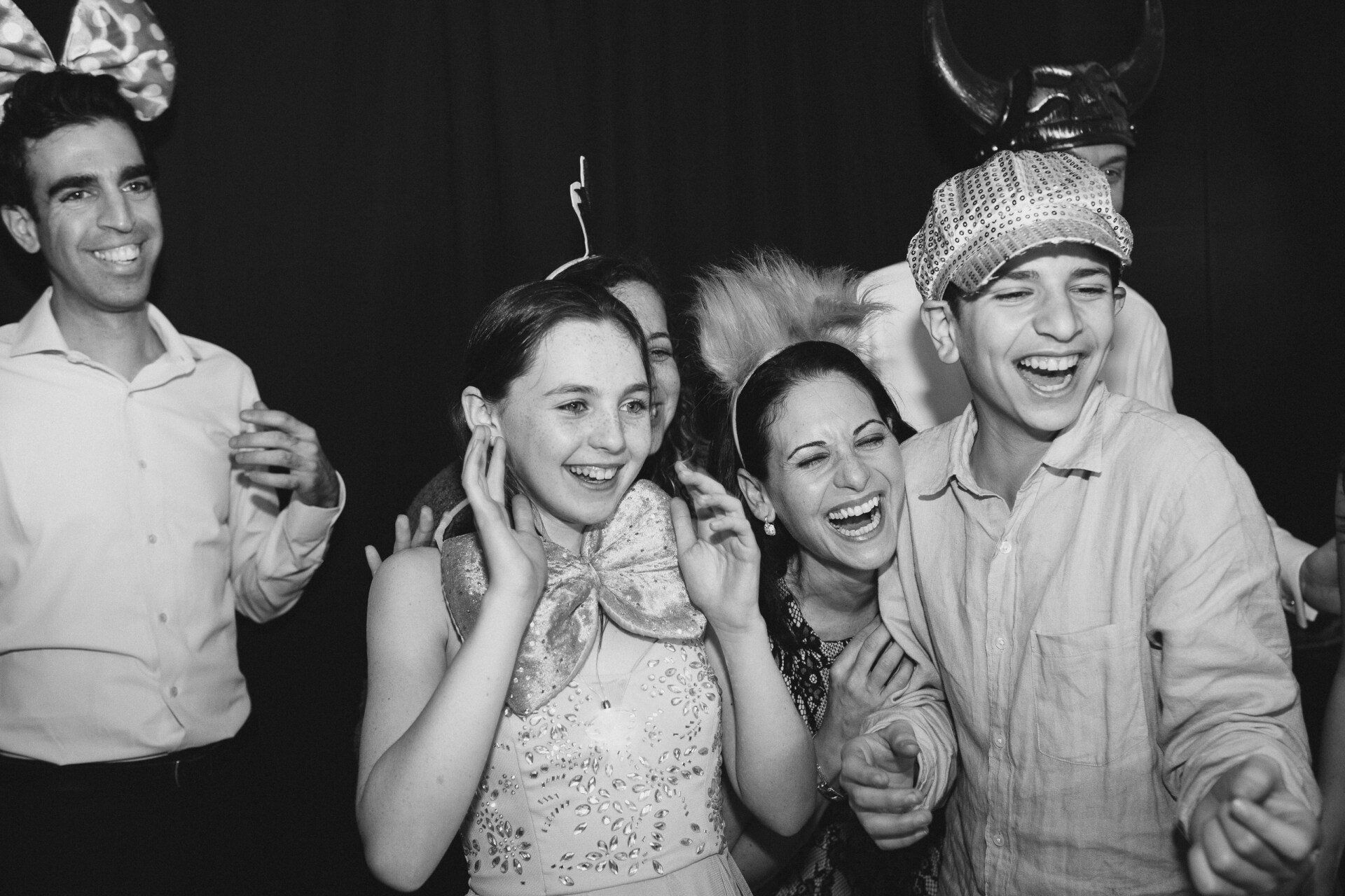 Group of children laughing at a bat mitzvah event