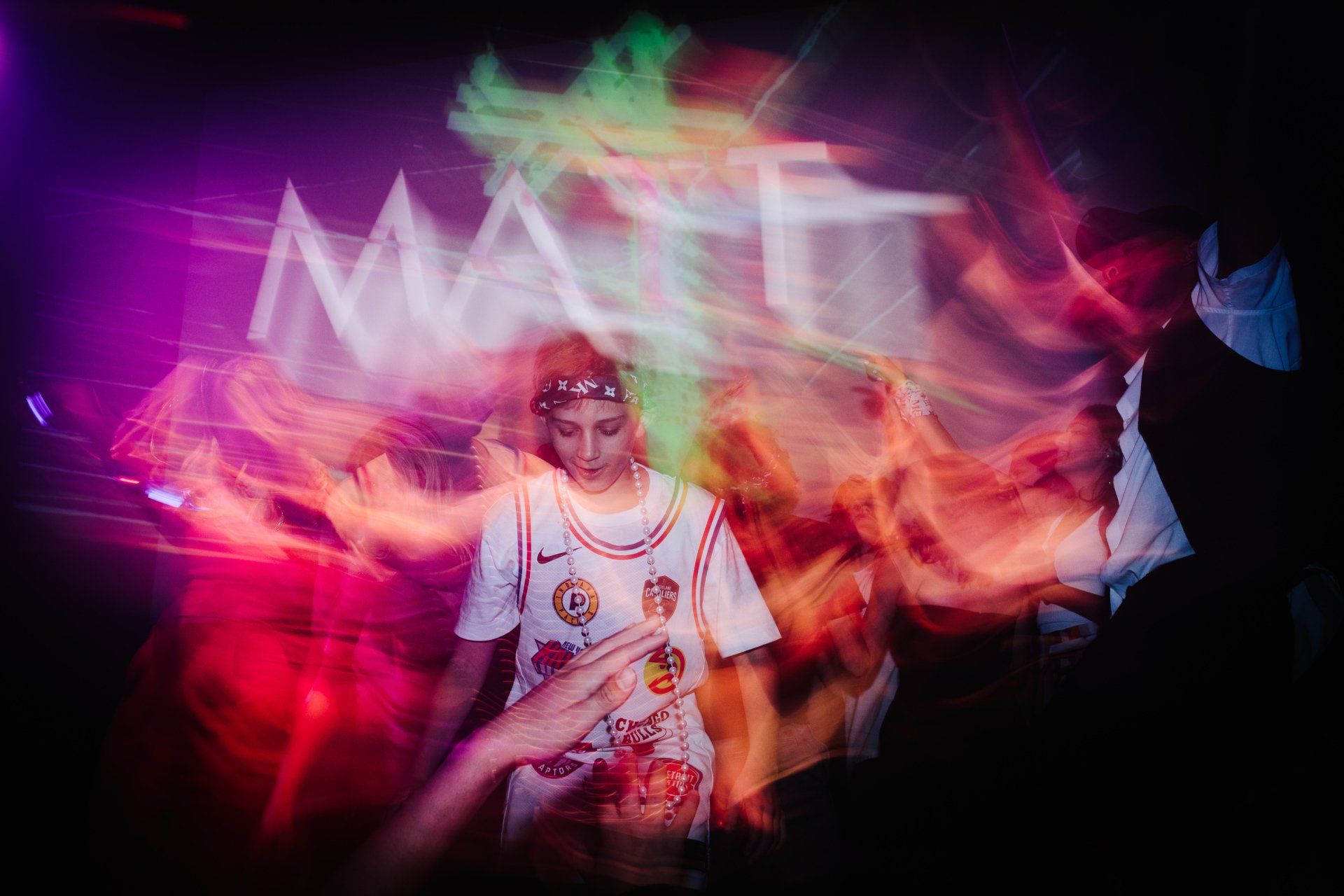 A wild picture of a young boy at his birthday party