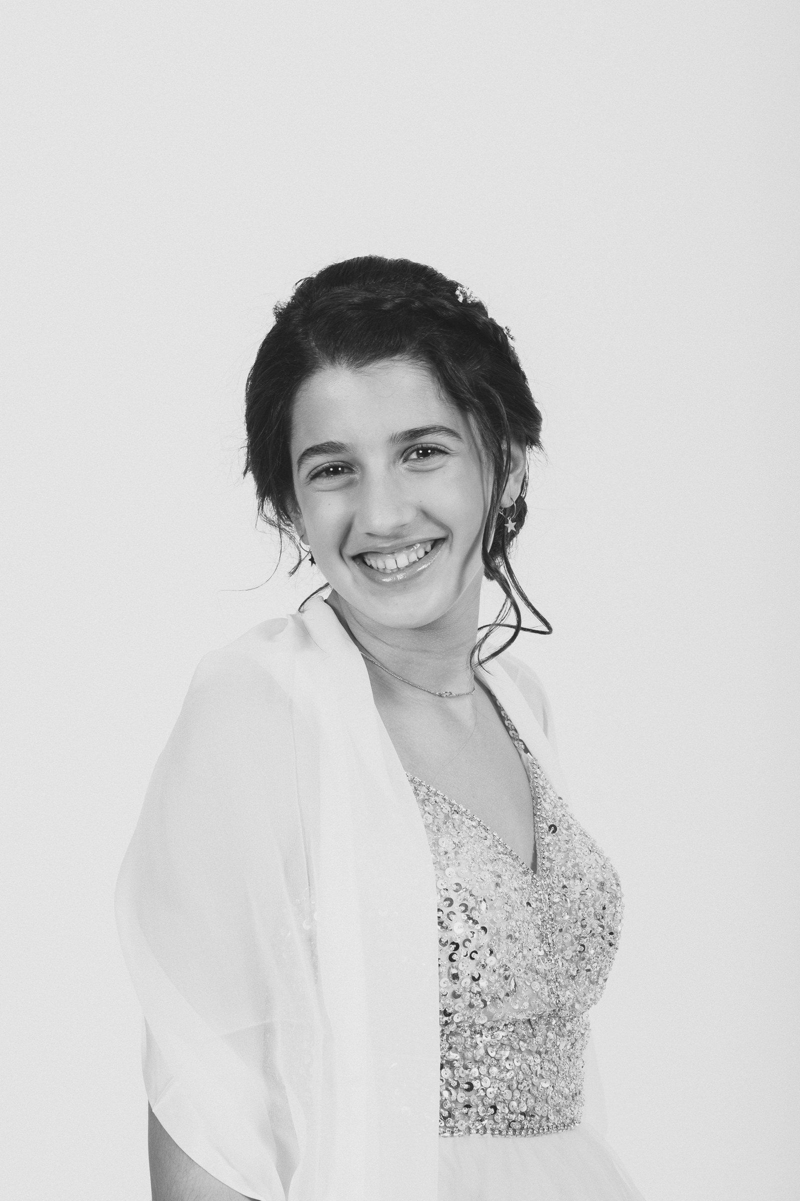 B&W portrait photo of a young woman