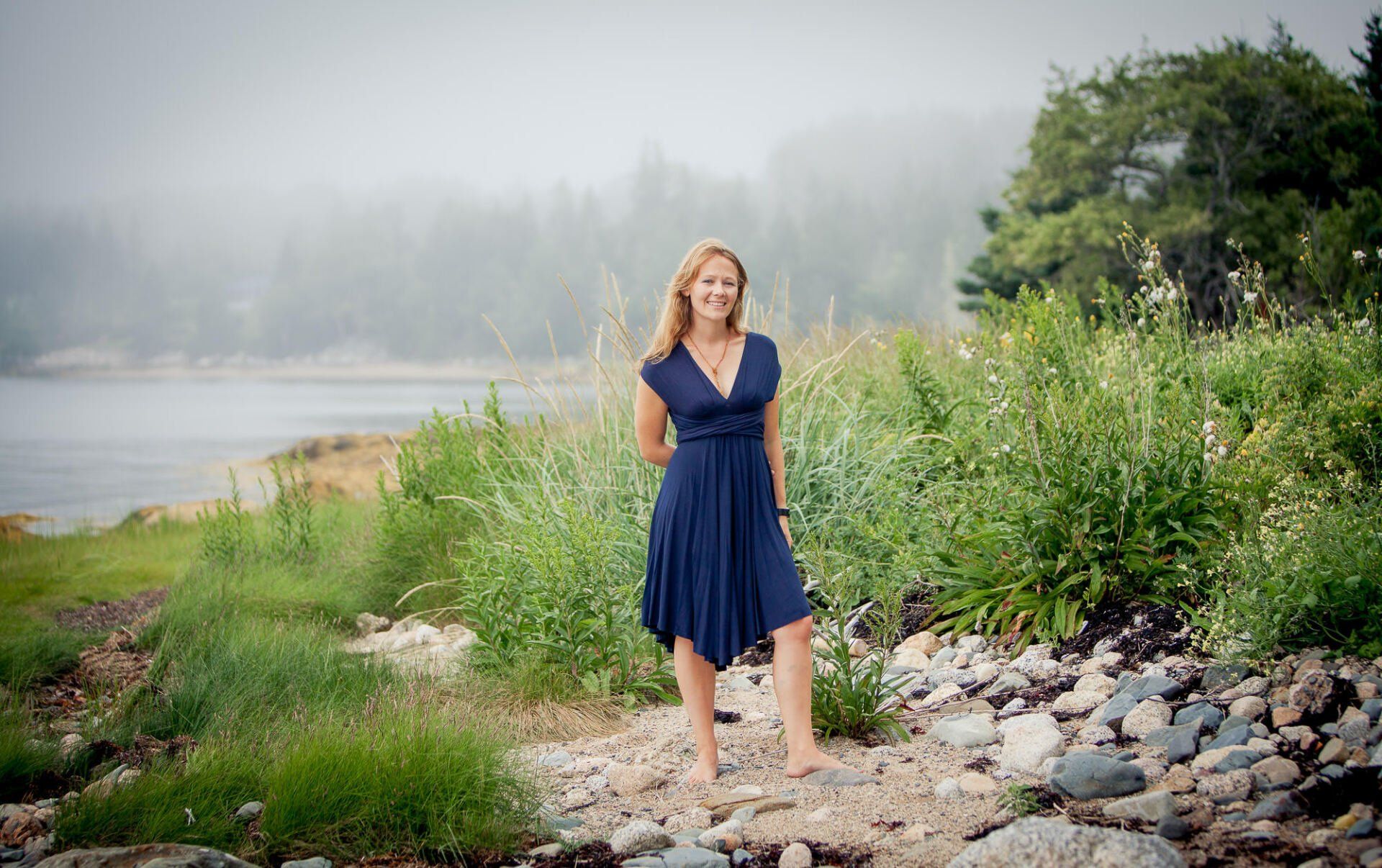Portrait photo of a woman by the sea