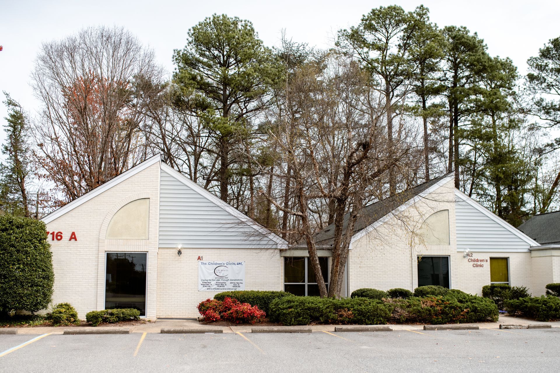 A white building with the number 36 a on it.