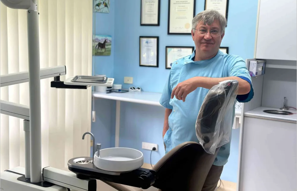 A Dentist In His Clinic — Highlands Denture Clinic in Willow Vale, NSW