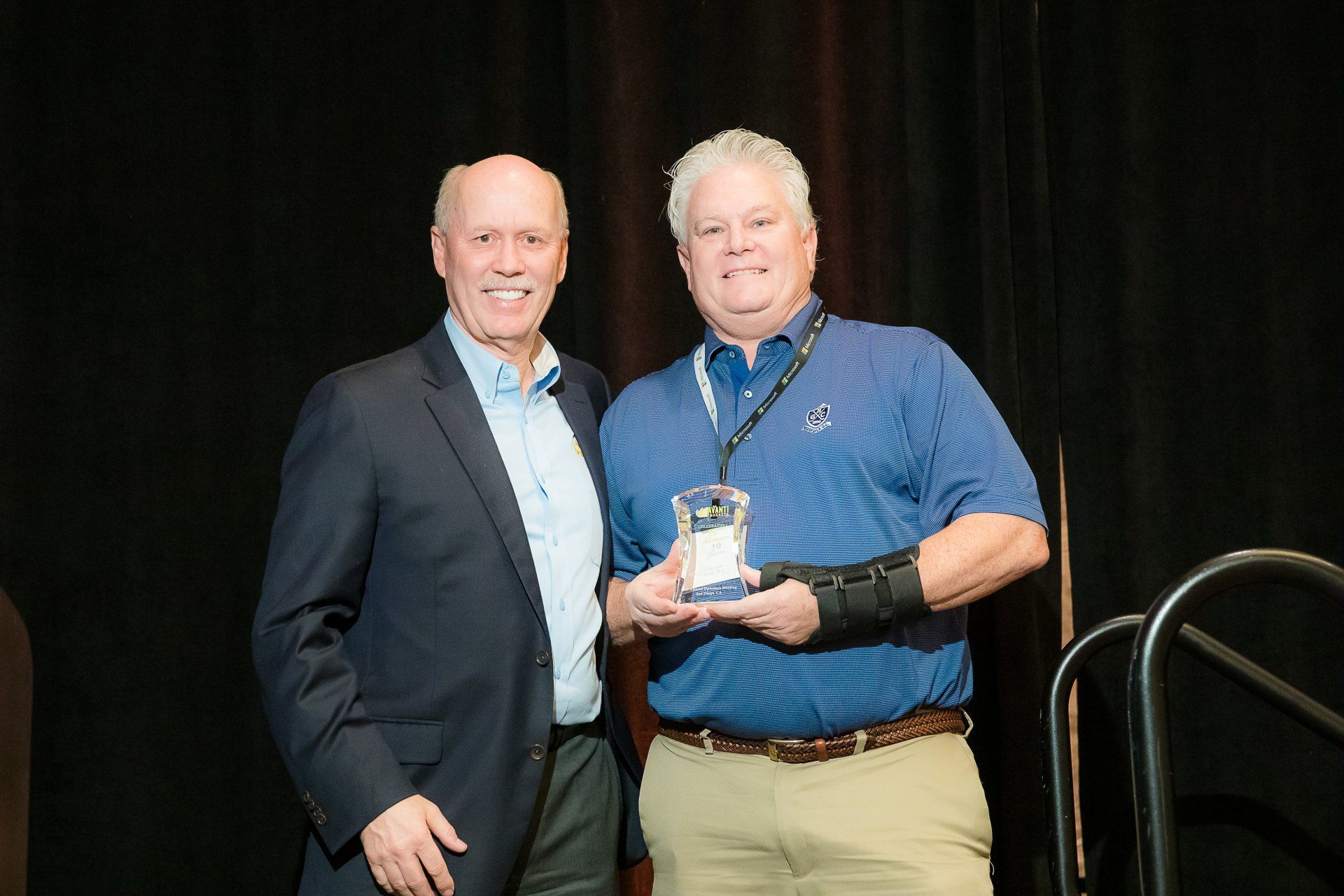 Steve Foley accepts award for Operator of the Year from Jim Brinton, CEO of Avanti Markets