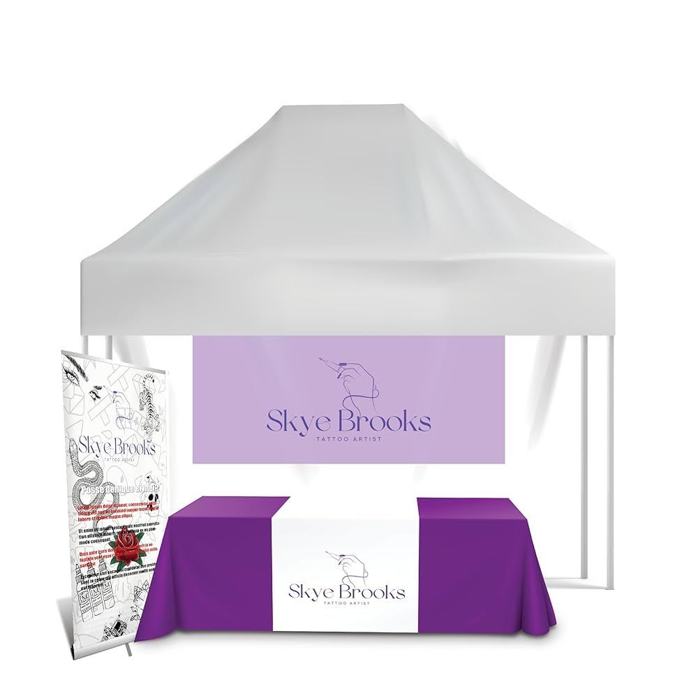 Purple table setup at an event booth for Skye Brooks brand. Banner, table cloth and roll-up sign in purple.