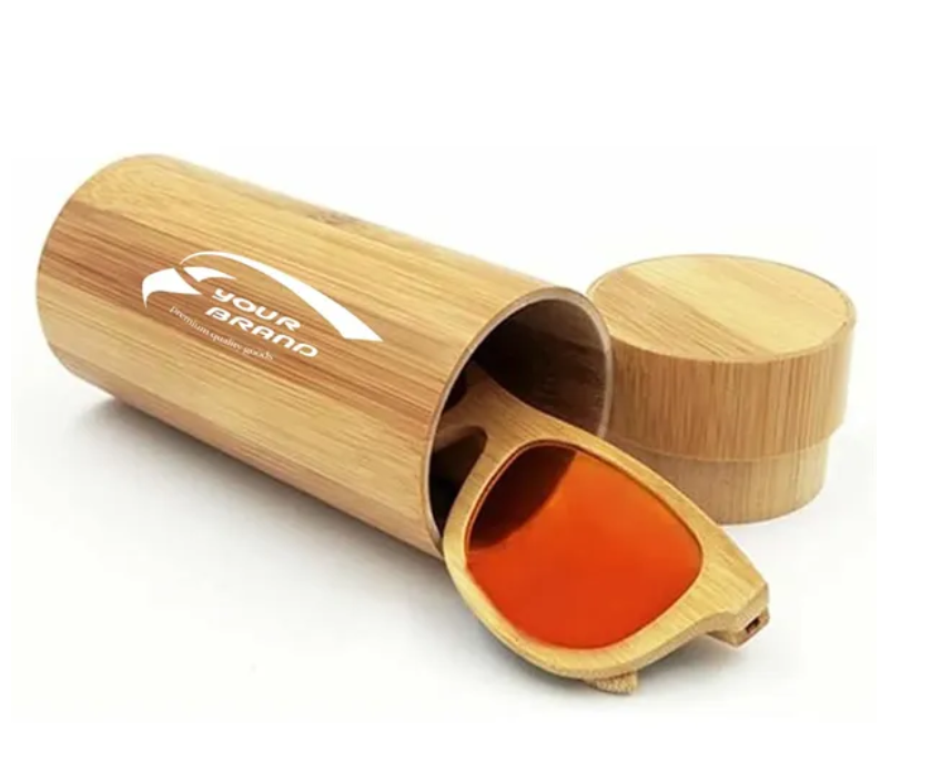 Sunglasses with orange lenses in a bamboo case, lid removed. Case has a logo.