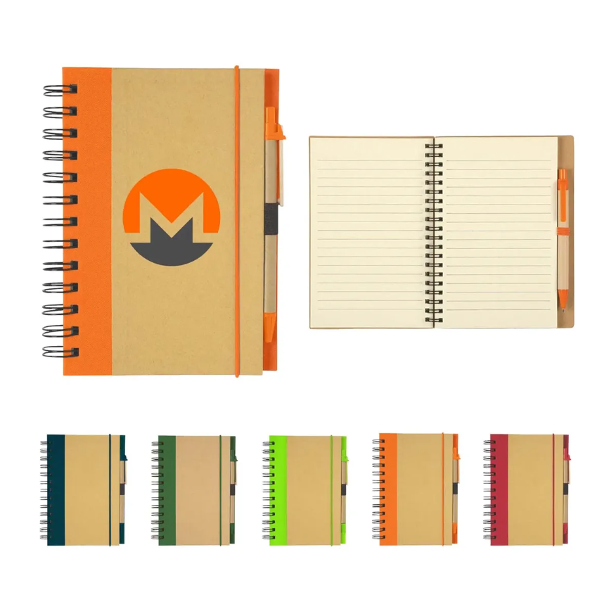Notebook with Monero logo, orange accent, pen, and various colored spines.