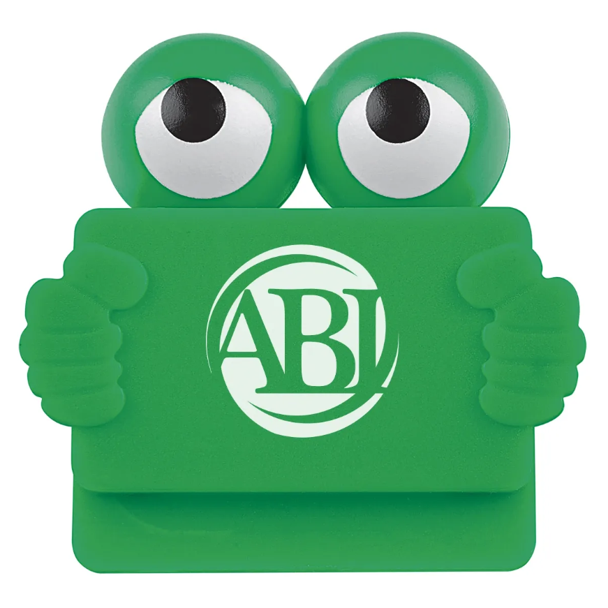 Green frog-like clip holding a sign with 