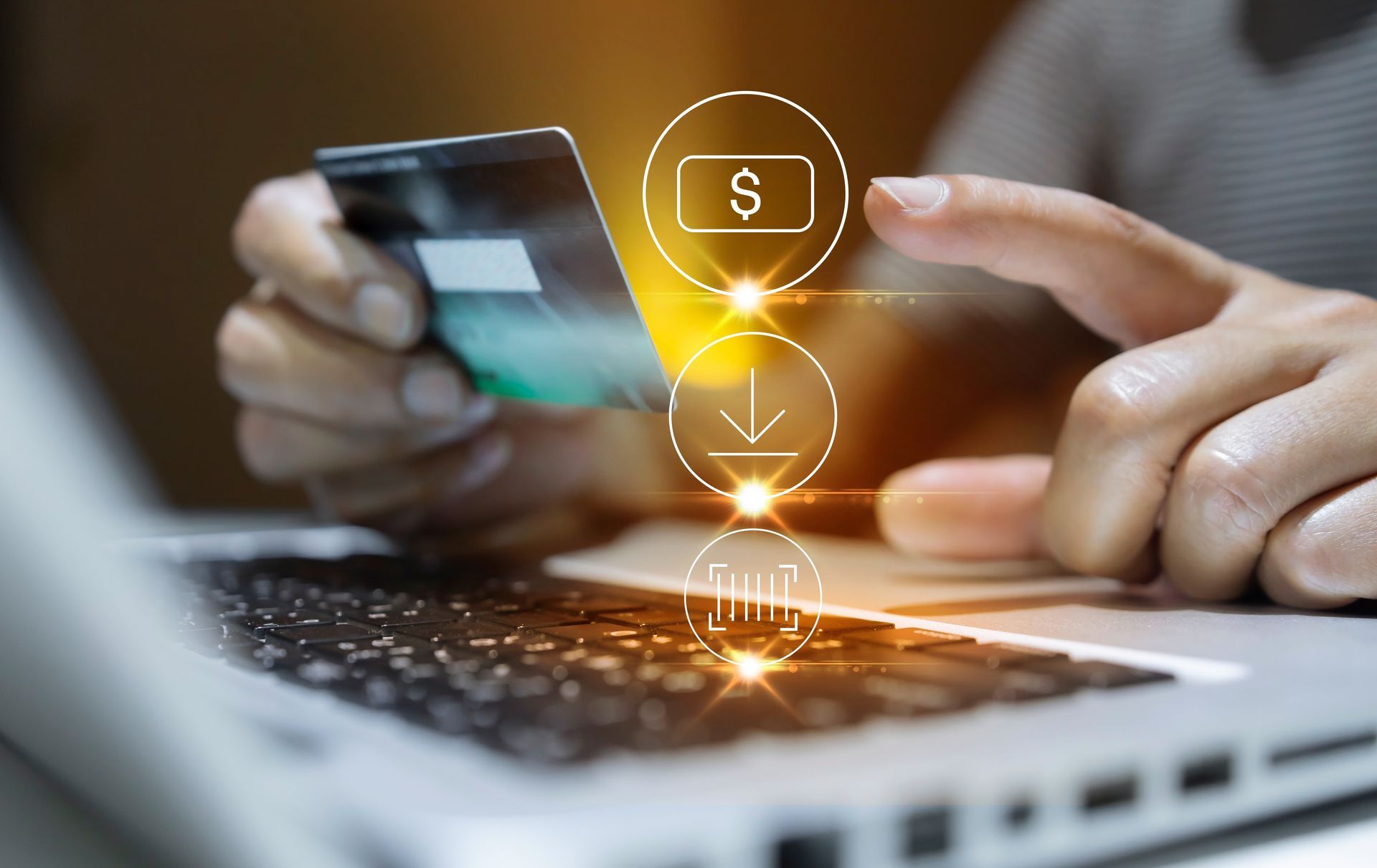 Person holding a credit card and using a laptop, with digital payment icons overlaid.