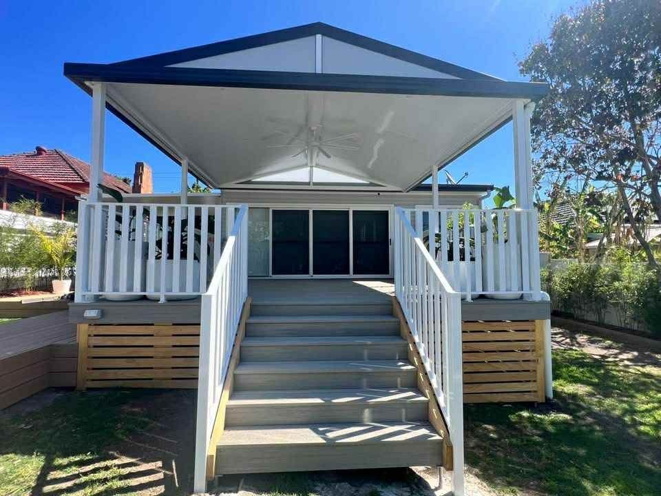 White House with Porch and Steps, Covered by A White Awning on A Sunny Day — Hunter Home Services in Thornton, NSW