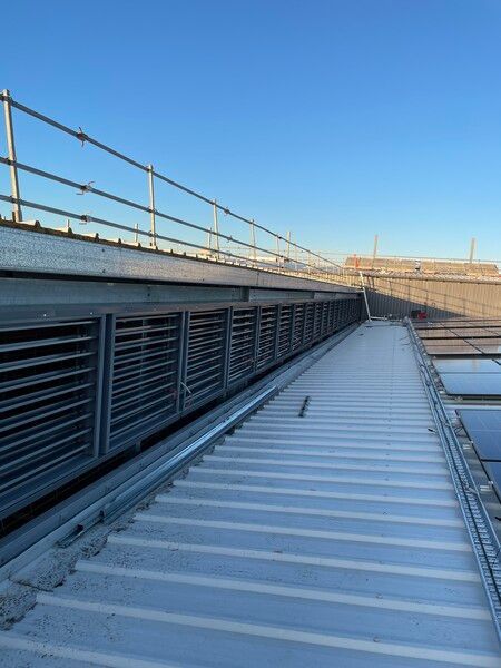 The Roof of A Building with A Blue Sky in The Background — Leisure Coast Powder Coaters in Unanderra, NSW