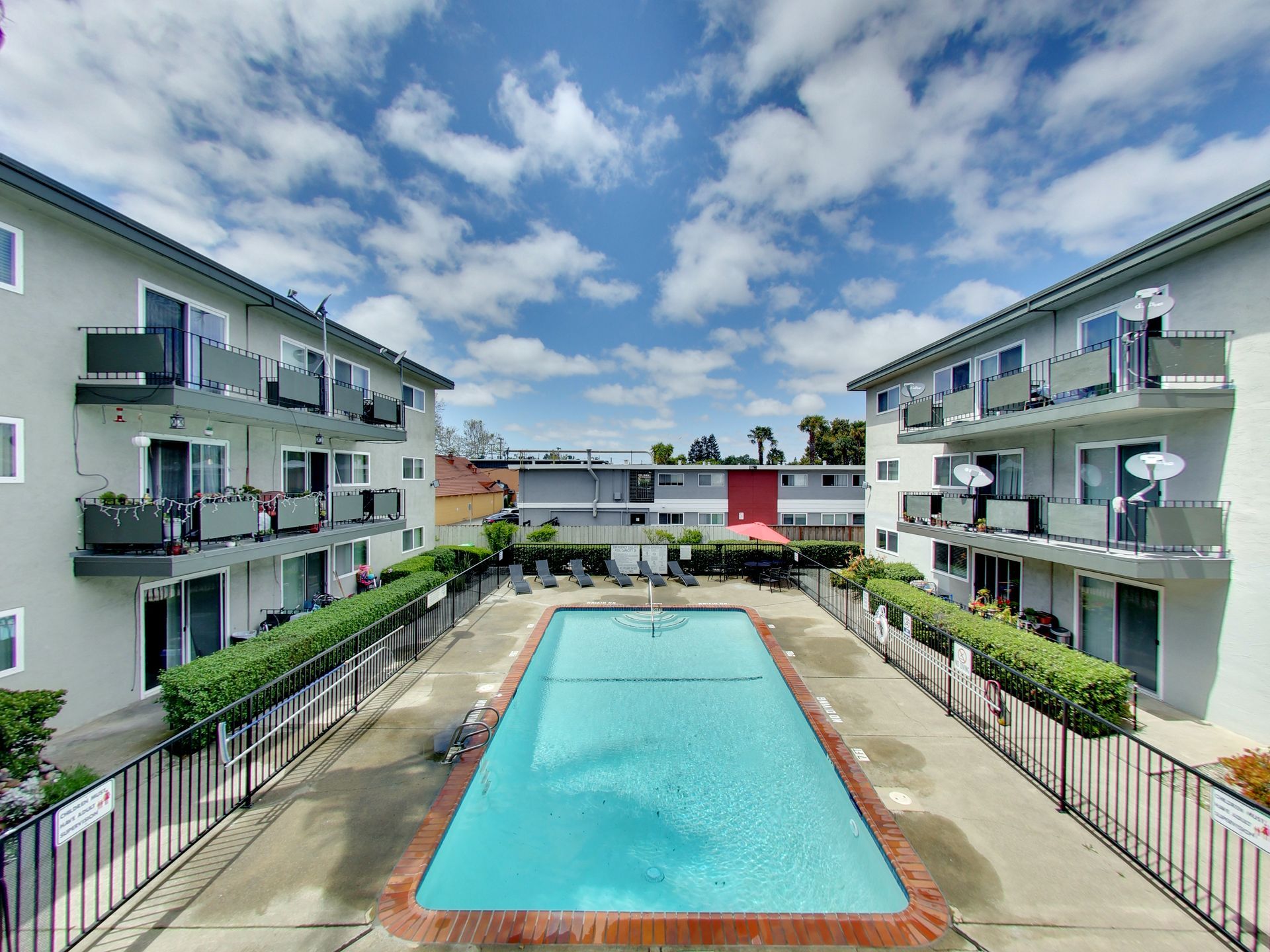 A large swimming pool in the middle of a building