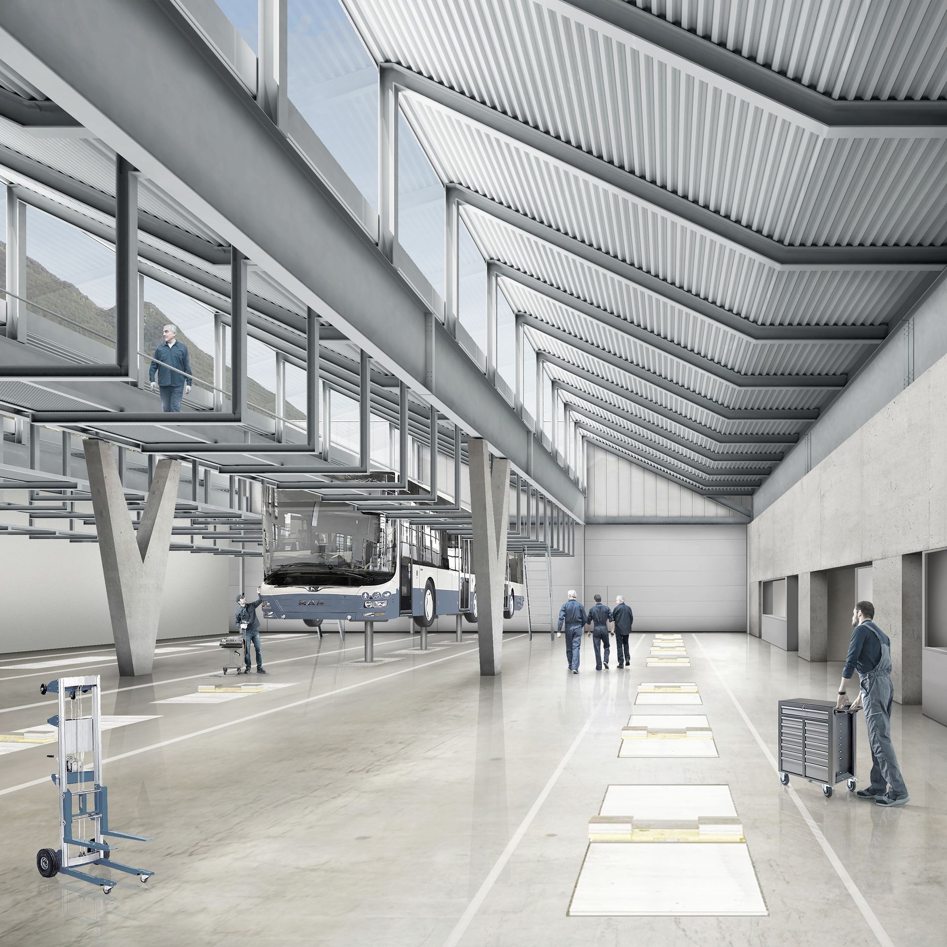 Ampio interno industriale con soffitti alti, operai e macchinari.