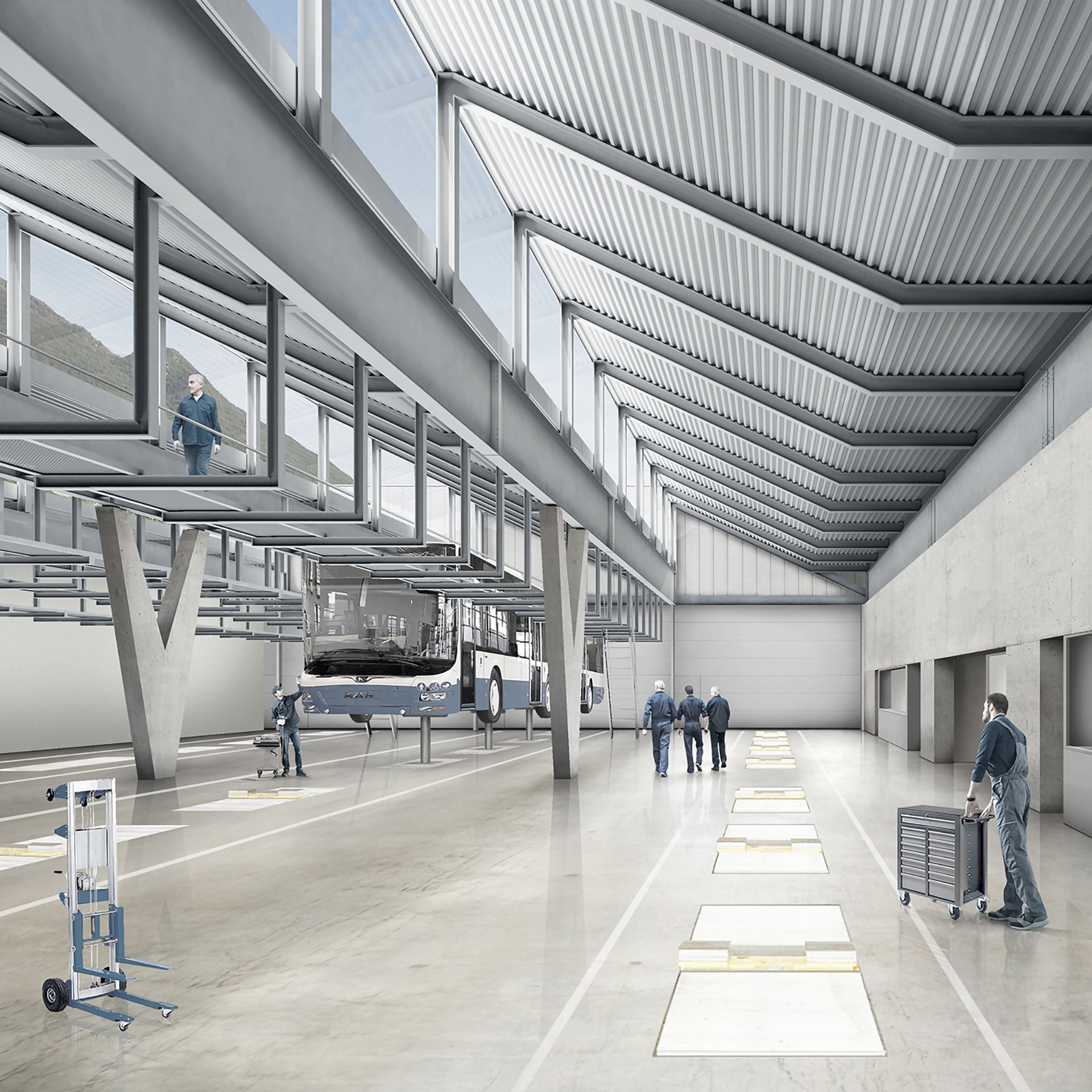 Interno di un'officina moderna con soffitti alti, ampie finestre e persone al lavoro. Struttura in cemento e metallo.