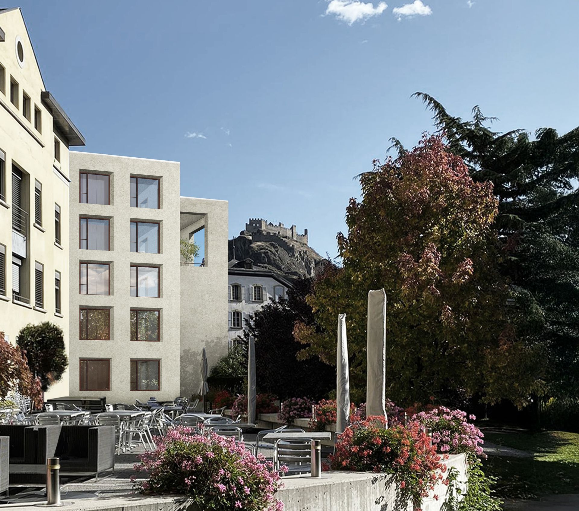 Vista esterna di edifici con finestre colorate, alberi, fiori e un castello in cima alla collina in una giornata di sole.