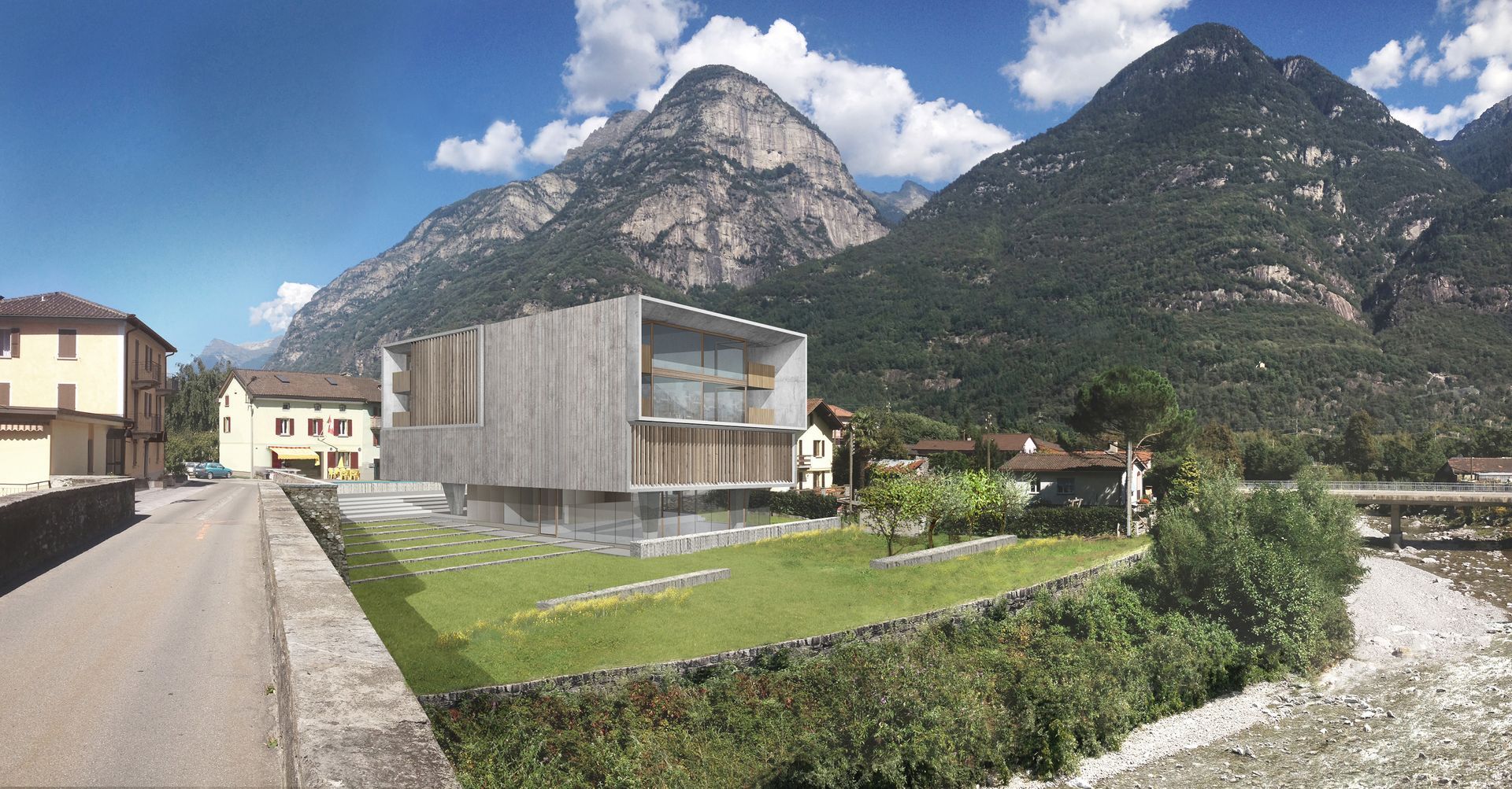 Moderno edificio in legno in un villaggio, montagne sullo sfondo, un fiume in primo piano.