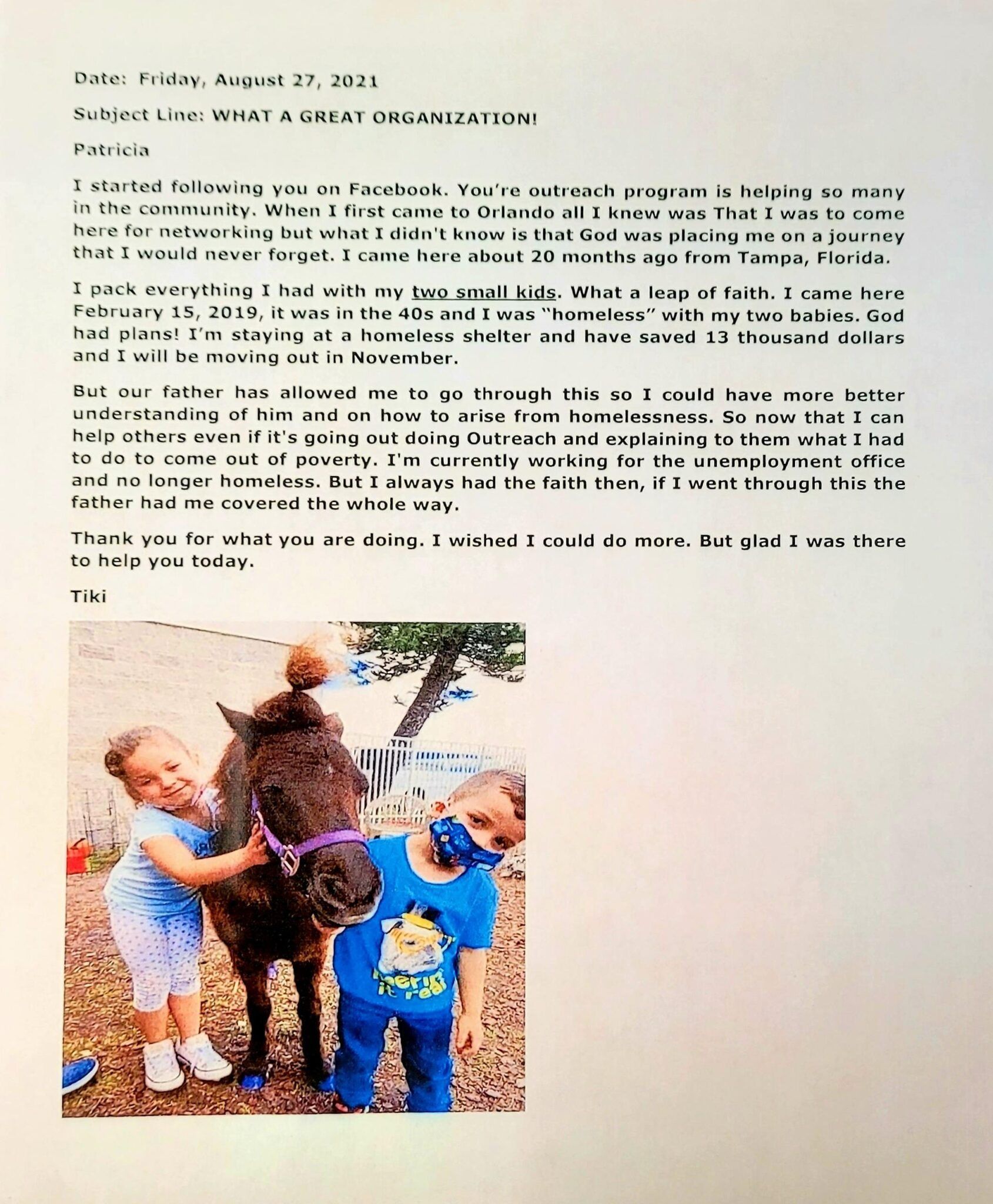 Letter with handwritten text and photo of two children with a pony.