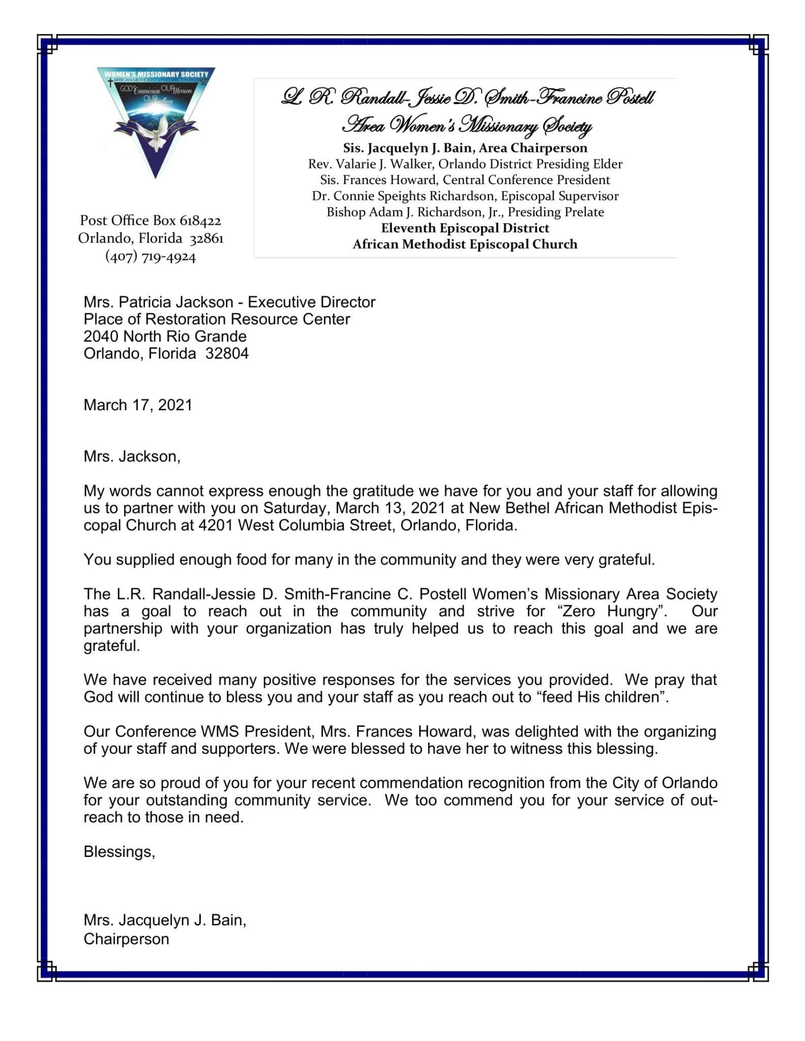 A formal letter on blue bordered paper with a logo at the top left.