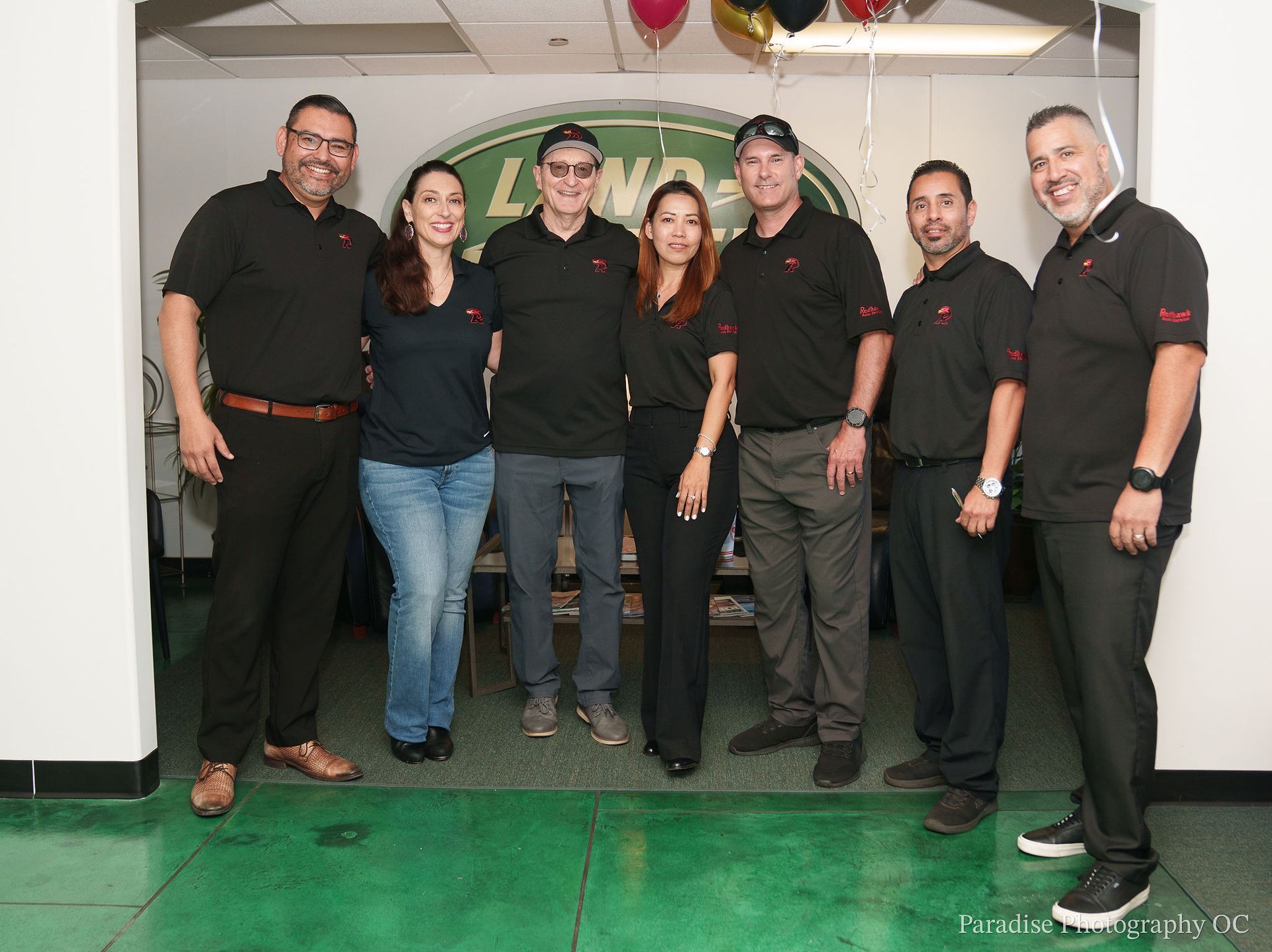 Redhawk Auto Service team posing at the Mission Viejo Grand Opening ceremony.