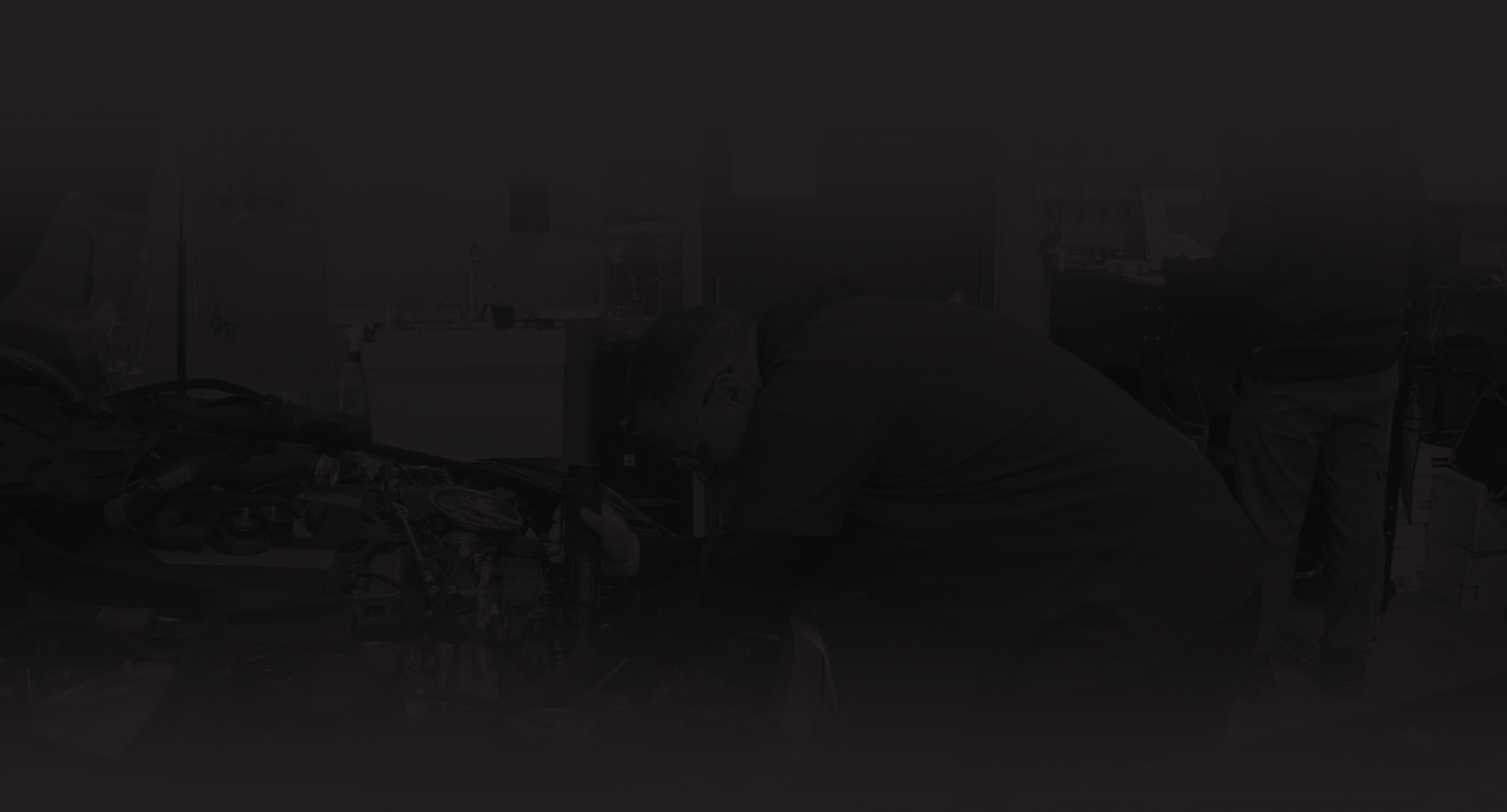Staff at work in garage | Redhawk Auto Service