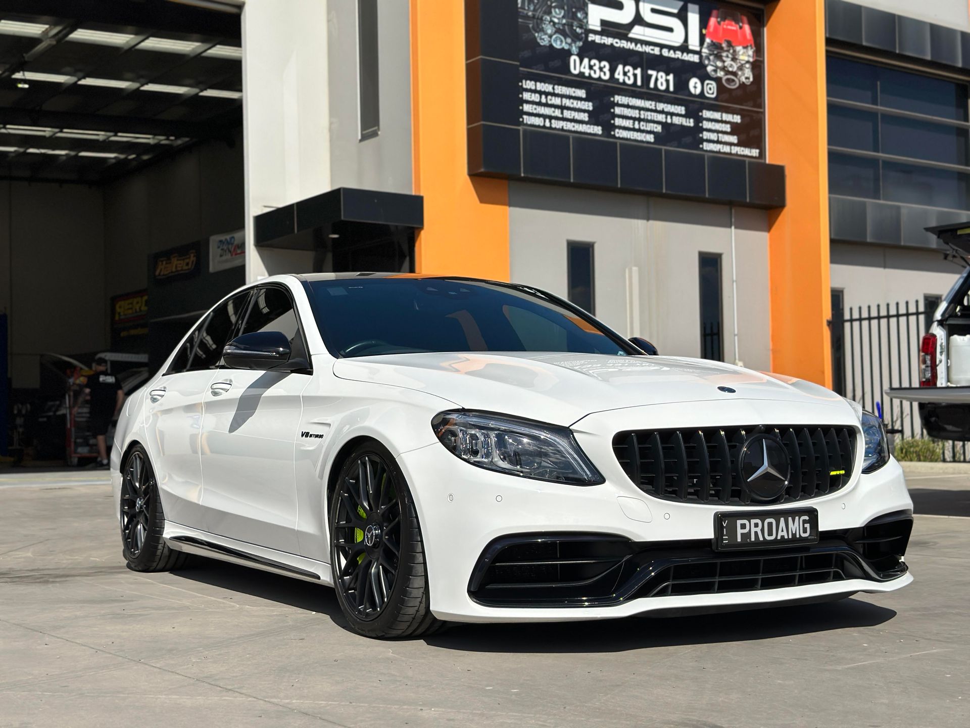 Ceramic Coating - Genuine HSV Group A Walkinshaw is parked in a garage next to a window