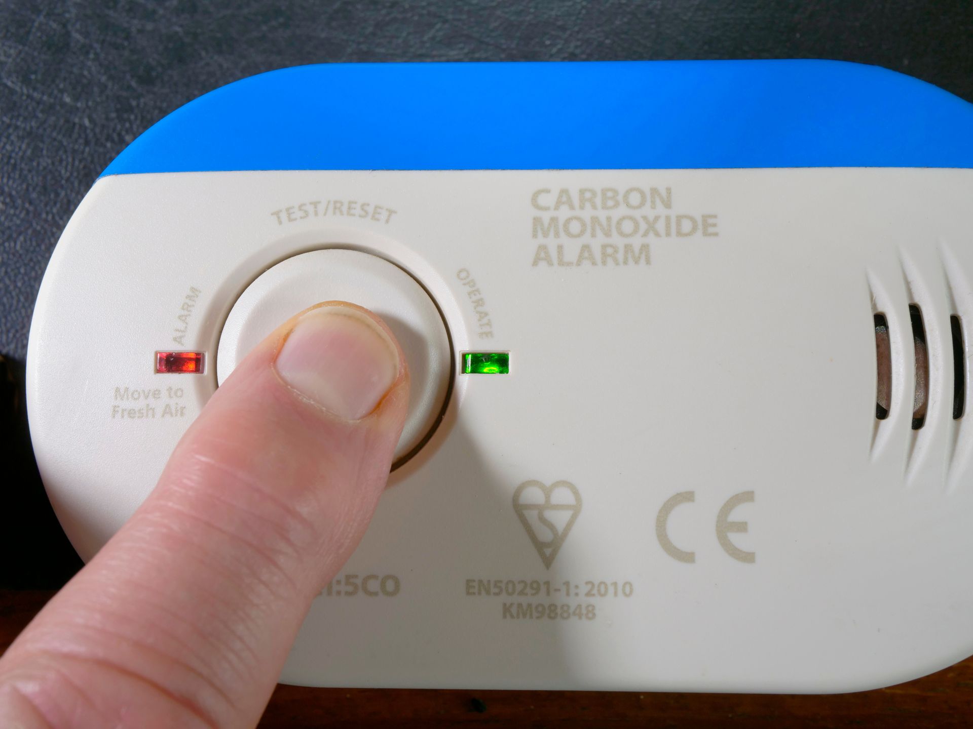 Hand pressing a 