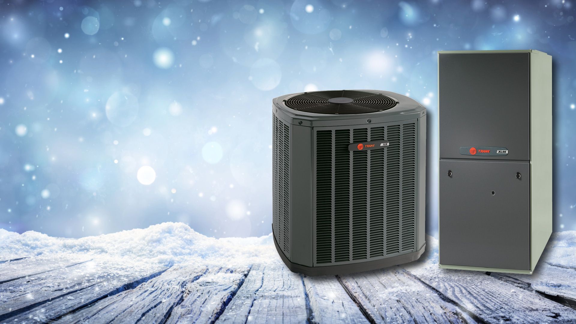 snowy background with Trane heat pump and furnace