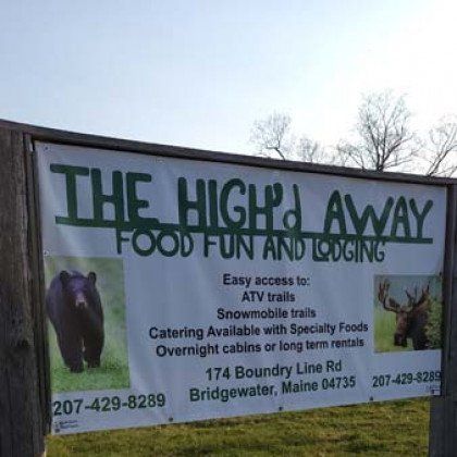 A sign for the highway food fun and lodging