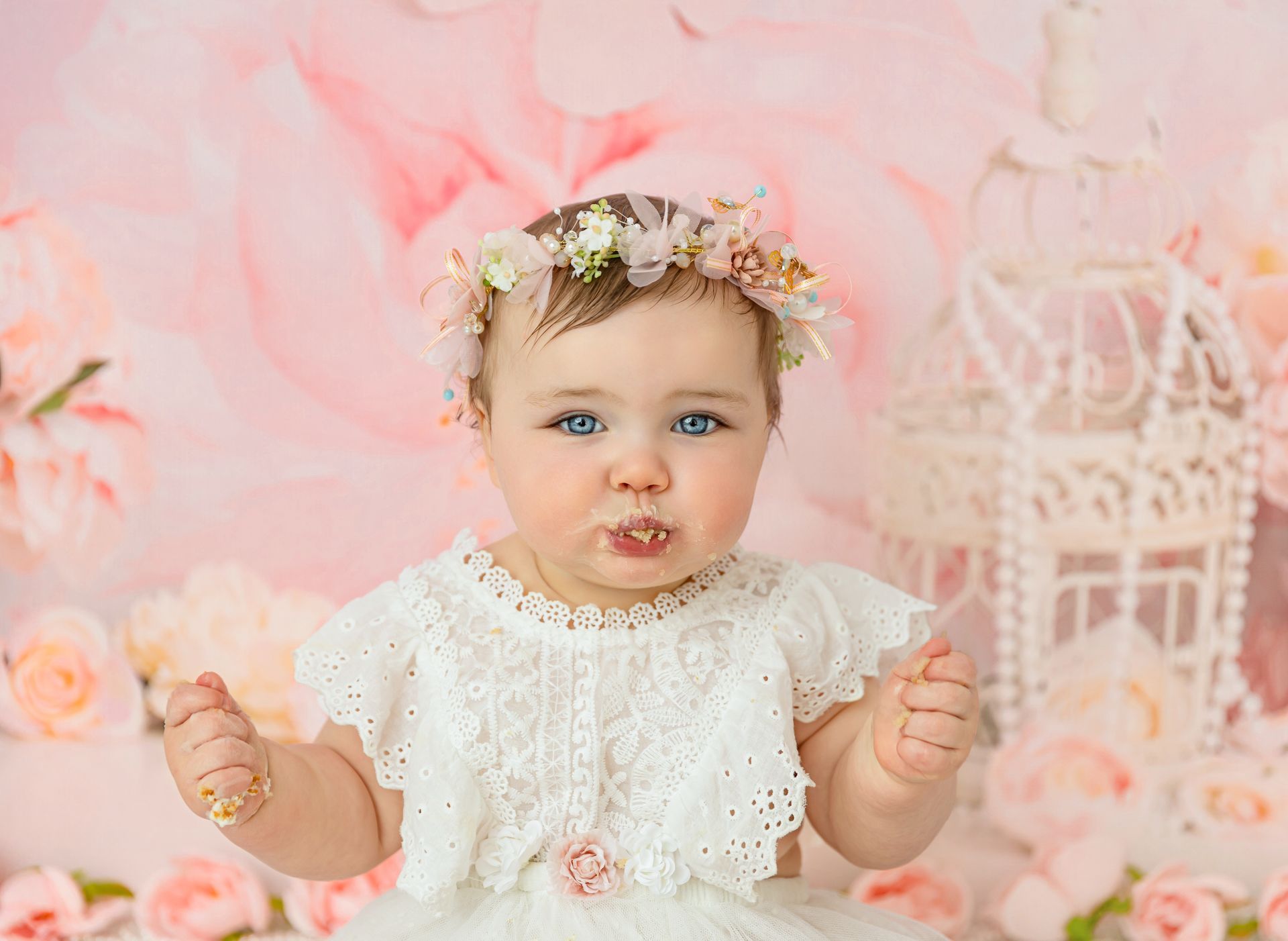 Floral cake smash setup in calm studio setting, Cary NC