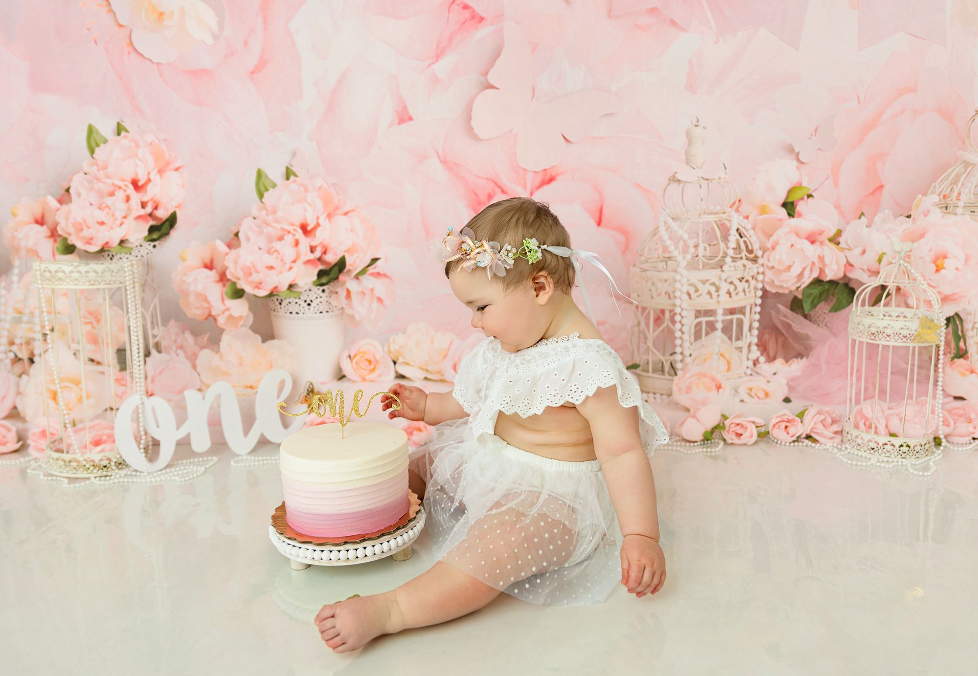 Baby-led floral cake smash portrait session in Cary studio