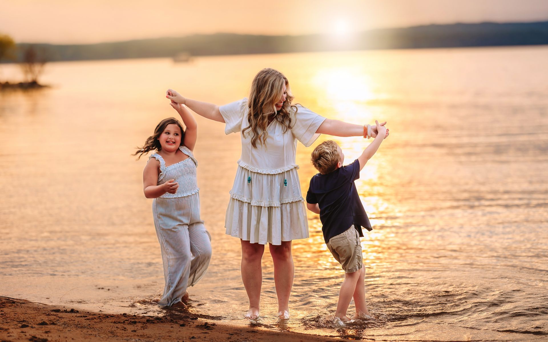 Mother, Father and baby peacefully sleeping during the morning portrait session at the Raleigh Rose Garden